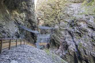 Path construction in the Liechtensteinklamm gorge with protective nets against rockfall
