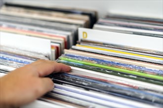 Choosing the vinyl in the vinyl record shop