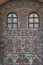 Door with iron ornamentation in Freiburg Innensradt