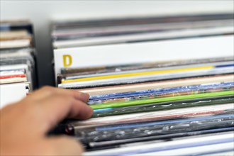 Choosing the vinyl in the vinyl record shop