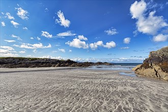 Sandy beach beach in bay at low tide