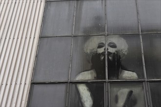 Industrial window with Marilyn Monroe behind the panes