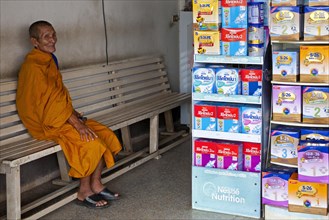 Monk in shop