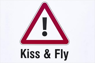 Kiss & Fly warning sign