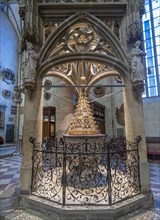 Baptismal font under a canopy in the Cathedral of Our Lady in Ulm