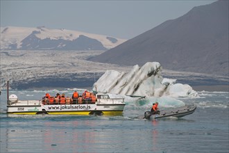 Amphibious vehicle with passengers