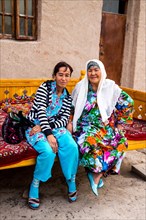 Women in traditional traditional costume and modern dress