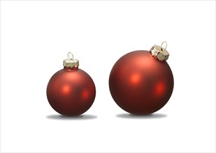 Two red Christmas balls on a white background with stand shadow