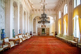 White hall lined with mirrors