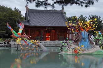 Illuminated figures at the Chinese Garden
