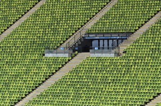 Green rows of seats in the Olympic Stadium
