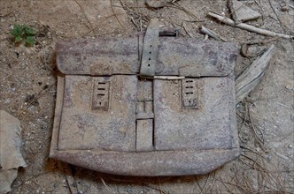 Broken and dusty leather briefcase