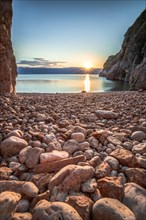 Beach of stones by the sea