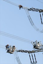 High-voltage fitters at work