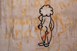 Naked woman painted as stick figure on wall