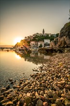 Historical village by the sea. Bay with harbour in the morning