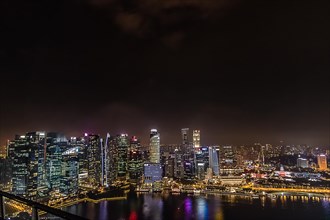 View of the skyline at night from Marina Bay Sands