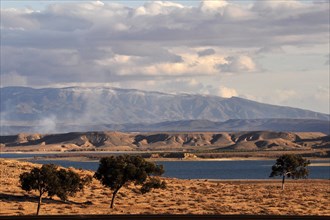 Inland lake in barren landscape of Rif Mountains