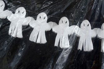 White Paper Garland with Ghosts for Halloween