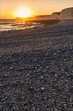 Sunset on shingle beach