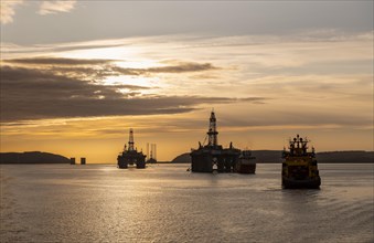 Oil rigs and a supply vessel in the harbour area of Invergordon