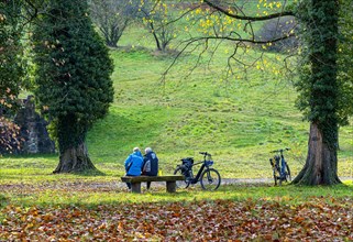 Cyclists taking a rest in the forest