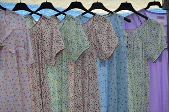 Nightdresses on hangers at market