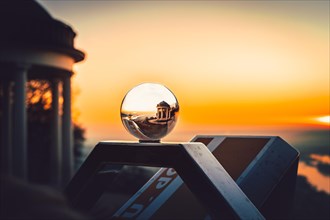 Lensball on a binocular in the sunrise