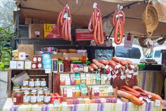 Market stall with sausages and local products