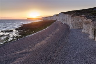 Sunset on chalk coast with shingle beach