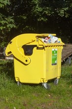Yellow bin for plastic waste