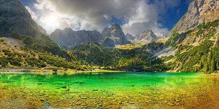 Turquoise Lake Seebensee and the peaks of the Drachenkopf