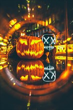 Man with Purge mask with Halloween pumpkin