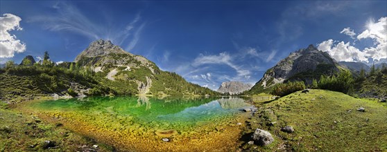 360 mountain panorama at the turquoise Seebensee with the mountain peaks of the Sonnenspitze