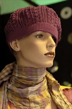 Female mannequin with knitted cap