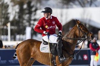 Max Charlton of Team St. Moritz sits on his horse waiting for the match to start