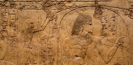 The tomb lord Ramose during a purification ritual performed by two priests