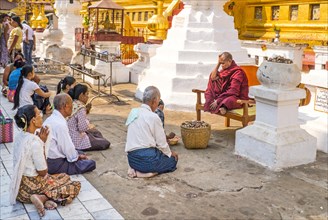 Teaching the faithful by monk in Shwezigon Pagoda