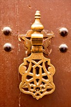 Ornate metal door knocker in the Marrakech Kasbah