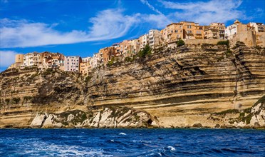 Steep coast of Bonifacio with old town on a limestone plateau