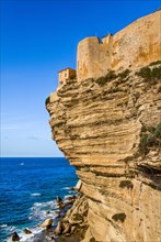 Steep coast of Bonifacio with old town on a limestone plateau