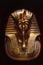 Eleven-kilogram mask made of solid gold with inlays of glass paste and gemstones