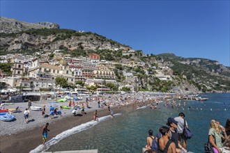 People sunbathing on the Beach of Positano