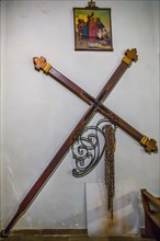 Cross with chains in the church of Saint-Marie