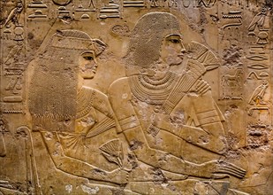 The brother of Ramose with his woman. The high official carries the Shem sceptre in accordance with his official dignity