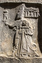 King Tudhaliya IV embraced by Sarruma