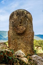Central monument with menhir statues