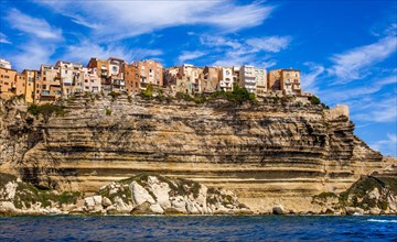 Steep coast of Bonifacio with old town on a limestone plateau