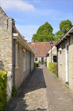 Narrow cobblestone paths between the houses in Bourtange