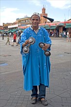Jugglers as a tourist attraction on the Jemaa El-Fna